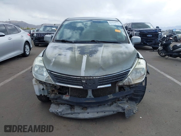 2009 Nissan Versa 1.8 S with VIN 3N1BC11E39L381507, listed as a IAAI auction lot 41956643 with 120,730 mi miles. Bid and sale history available at carsss.com. Image 6.