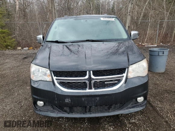 2011 Dodge Grand Caravan Crew with VIN 2D4RN5DG2BR762738, listed as a Copart auction lot 49528955 with 203,748 mi miles and Clean Title. Bid and sale history available at DreamBid. Image 5.