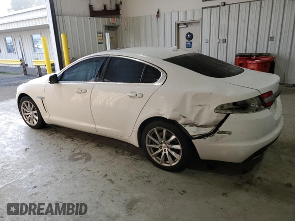 2015 Jaguar XF T Premium with VIN SAJWA0FS3FPU67494, listed as a Copart auction lot 83887334 with 112,379 mi miles and Salvage Title. Bid and sale history available at carsss.com. Image 2.