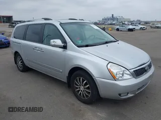 2012 Kia Sedona EX with VIN KNDMH4C78C6431441, listed as a IAAI auction lot 42013427 with 213,147 mi miles. Bid and sale history available at carsss.com. Image 1.