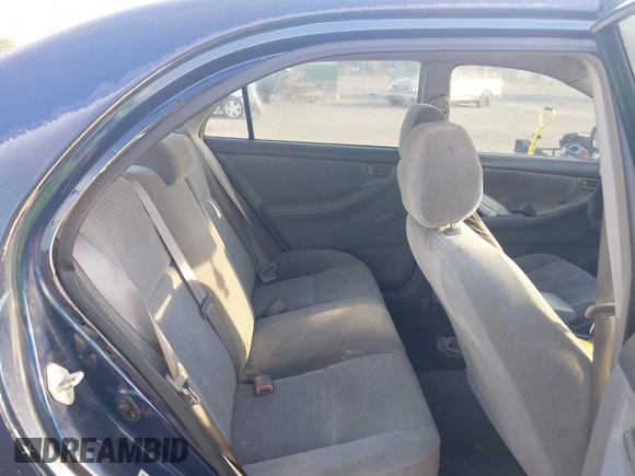 2005 Toyota Corolla CE with VIN 1NXBR32E25Z563569, listed as a IAAI auction lot 42100384 with 243,610 mi miles and . Bid and sale history available at DreamBid. Image 8.
