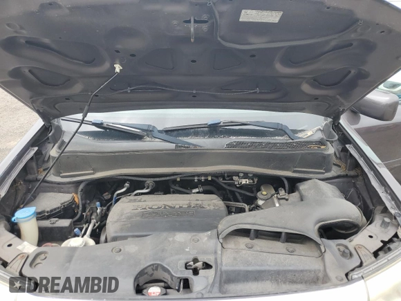 2012 Honda Pilot EX-L with VIN 5FNYF4H71CB005627, listed as a Copart auction lot 64117825 with 145,957 mi miles and Salvage title. Bid and sale history available at DreamBid. Image 12.