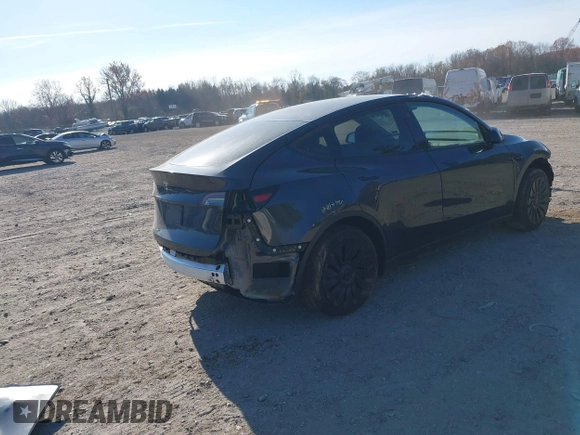 2024 Tesla Model Y with VIN 7SAYGDED3RF092501, listed as a IAAI auction lot 40820923 with 4,688 mi miles and . Bid and sale history available at DreamBid. Image 4.