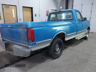1992 Ford F-150 with VIN 1FTEF14H3NP809819, listed as a IAAI auction lot 41931404 with 2,135,096 mi miles. Bid and sale history available at carsss.com. Image 4.