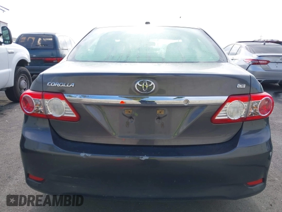 2011 Toyota Corolla L with VIN JTDBU4EE7B9162022, listed as a IAAI auction lot 42066643 with 124,384 mi miles. Bid and sale history available at carsss.com. Image 17.