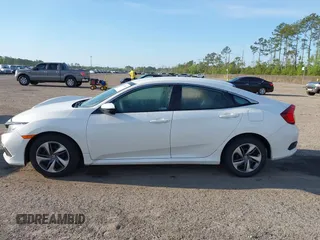 2020 Honda Civic LX with VIN 19XFC2F62LE212421, listed as a IAAI auction lot 41909995 with 46,312 mi miles and . Bid and sale history available at DreamBid. Image 14.
