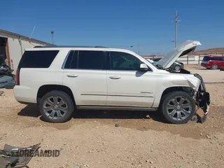 2015 GMC Yukon Denali with VIN 1GKS2CKJ3FR568729, listed as a IAAI auction lot 41741987 with 154,729 mi miles. Bid and sale history available at carsss.com. Image 13.