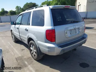 2003 Honda Pilot EX with VIN 2HKYF18443H571688, listed as a IAAI auction lot 42097297 with 313,910 mi miles. Bid and sale history available at carsss.com. Image 3.