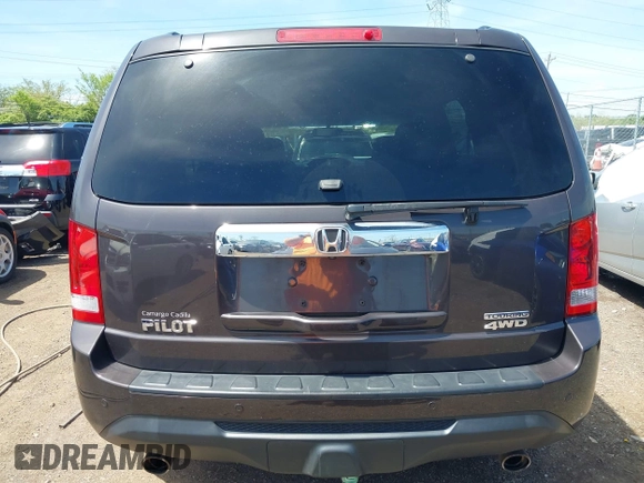 2012 Honda Pilot Touring with VIN 5FNYF4H9XCB083406, listed as a IAAI auction lot 42107651 with 217,678 mi miles. Bid and sale history available at carsss.com. Image 17.