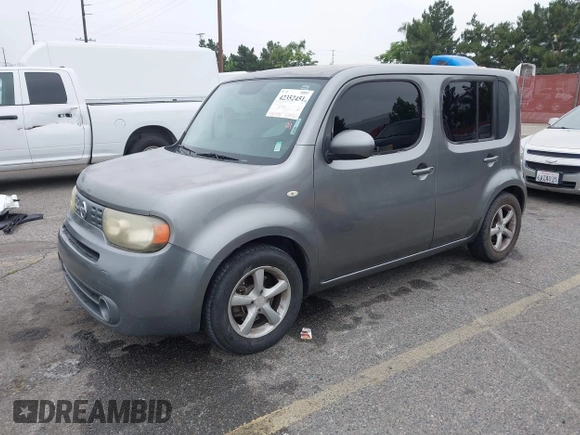 2010 Nissan Cube S z VIN JN8AZ2KR9AT153627, wystawiony jako IAAI lot #42352451 z przebiegiem 184 305 mil mil oraz . Historia ofert i sprzedaży dostępna na DreamBid. Obrazek 2.