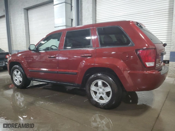 2007 Jeep Grand Cherokee Laredo with VIN 1J8GR48K27C687033, listed as a Copart auction lot 52401165 with 135,146 mi miles and Salvage Title. Bid and sale history available at carsss.com. Image 2.