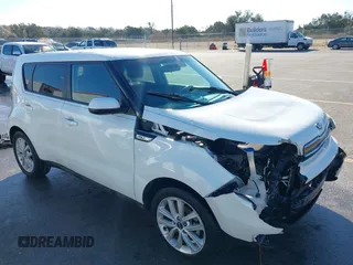 2018 Kia Soul + with VIN KNDJP3A50J7603244, listed as a IAAI auction lot 41670375 with 121,528 mi miles. Bid and sale history available at carsss.com. Image 1.