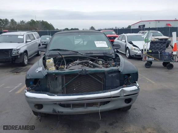1998 Dodge Dakota SLT with VIN 1B7GL22X1WS615049, listed as a IAAI auction lot 41369967 with 259,598 mi miles. Bid and sale history available at carsss.com. Image 12.