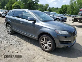 2014 Audi Q7 Premium Plus with VIN WA1LGAFE5ED009174, listed as a Copart auction lot 61073165 with 149,790 mi miles and Clean title. Bid and sale history available at DreamBid. Image 4.