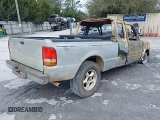 1997 Ford Ranger XLT with VIN 1FTCR14X3VTA51160, listed as a IAAI auction lot 41285990 with 1 mi miles. Bid and sale history available at carsss.com. Image 4.