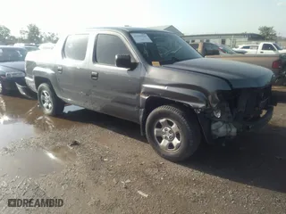 2009 Honda Ridgeline RT with VIN 2HJYK16209H500241, listed as a IAAI auction lot 33303791 with 153,452 mi miles. Bid and sale history available at carsss.com. Image 1.
