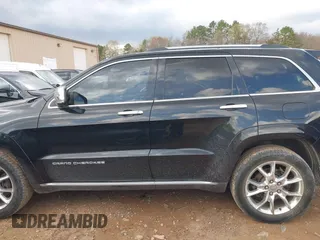 2015 Jeep Grand Cherokee Summit with VIN 1C4RJFJT1FC768707, listed as a IAAI auction lot 41863454 with 122,564 mi miles. Bid and sale history available at carsss.com. Image 14.