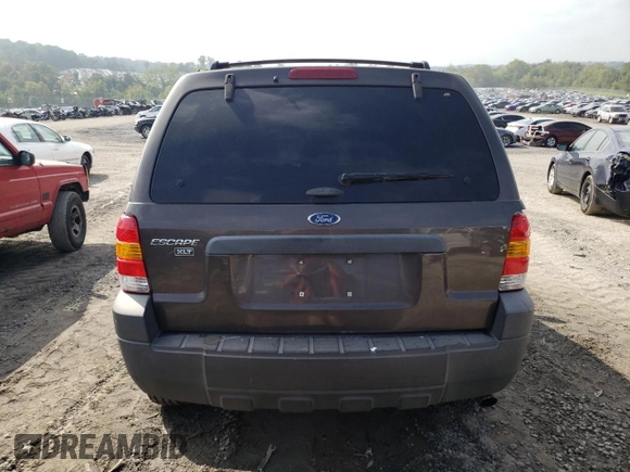 2006 Ford Escape XLT with VIN 1FMYU03Z46KD02983, listed as a Copart auction lot 74521394 with 357,594 mi miles and Salvage Title. Bid and sale history available at carsss.com. Image 6.