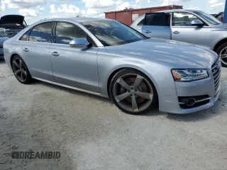 2015 Audi S8 with VIN WAUK2AFD6FN011936, listed as a Copart auction lot 74001664 with 0 mi miles and Salvage Title. Bid and sale history available at carsss.com. Image 4.