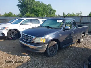 2002 Ford F-150 XL z VIN 1FTRX17W62NB63583, wystawiony jako IAAI lot #42439328 z przebiegiem 119 164 mil mil oraz . Historia ofert i sprzedaży dostępna na DreamBid. Obrazek 2.
