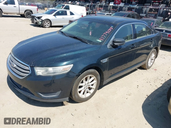 2014 Ford Taurus SE z VIN 1FAHP2D84EG162910, wystawiony jako IAAI lot #41779137 z przebiegiem Nie podano mil oraz . Historia ofert i sprzedaży dostępna na DreamBid. Obrazek 2.