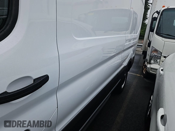 2023 Ford Transit Cargo z VIN 1FTBR1X83PKB55205, wystawiony jako IAAI lot #42569694 z przebiegiem 20 924 mil mil oraz . Historia ofert i sprzedaży dostępna na DreamBid. Obrazek 4.