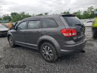 2015 Dodge Journey American Value z VIN 3C4PDCAB6FT649933, wystawiony jako Copart lot #54404415 z przebiegiem 144 830 mil mil oraz Szkoda całkowita • Salvage title. Historia ofert i sprzedaży dostępna na DreamBid. Obrazek 2.