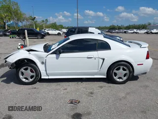 2004 Ford Mustang Standard with VIN 1FAFP40404F103699, listed as a IAAI auction lot 41804765 with 193,986 mi miles. Bid and sale history available at carsss.com. Image 14.
