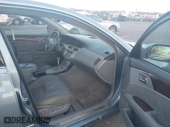 2010 Toyota Avalon XL with VIN 4T1BK3DB1AU363817, listed as a IAAI auction lot 41010053 with 259,106 mi miles and . Bid and sale history available at carsss.com. Image 5.