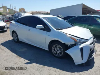 2021 Toyota Prius L Eco with VIN JTDKAMFU7M3150568, listed as a IAAI auction lot 42550557 with 128,165 mi miles and . Bid and sale history available at DreamBid. Image 1.