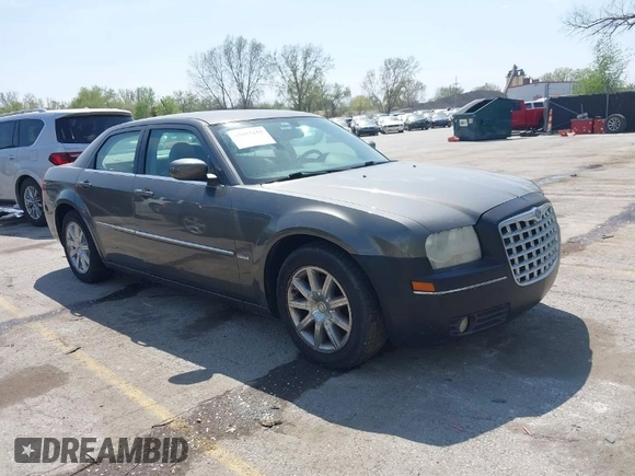 2008 Chrysler 300 Touring with VIN 2C3LA53G48H295678, listed as a IAAI auction lot 42007155 with 218,020 mi miles. Bid and sale history available at carsss.com. Image 1.