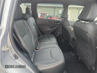 2022 Subaru Forester Wilderness z VIN JF2SKAMC9NH458949, wystawiony jako Copart lot #60811685 z przebiegiem 27 969 mil mil oraz Szkoda całkowita • Salvage title. Historia ofert i sprzedaży dostępna na DreamBid. Obrazek 11.