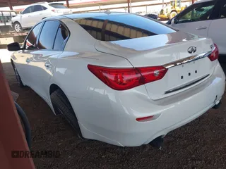 2015 Infiniti Q50 Premium z VIN JN1BV7AP4FM353666, wystawiony jako IAAI lot #42289579 z przebiegiem 96 894 mil mil oraz . Historia ofert i sprzedaży dostępna na DreamBid. Obrazek 3.