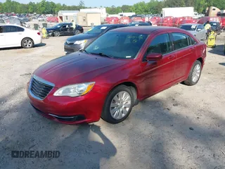 2014 Chrysler 200 LX with VIN 1C3CCBAB2EN212963, listed as a IAAI auction lot 42185158 with 244,647 mi miles. Bid and sale history available at carsss.com. Image 2.