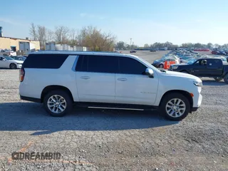 2022 Chevrolet Suburban Premier with VIN 1GNSCFKDXNR121180, listed as a IAAI auction lot 41833036 with 86,085 mi miles and . Bid and sale history available at DreamBid. Image 13.