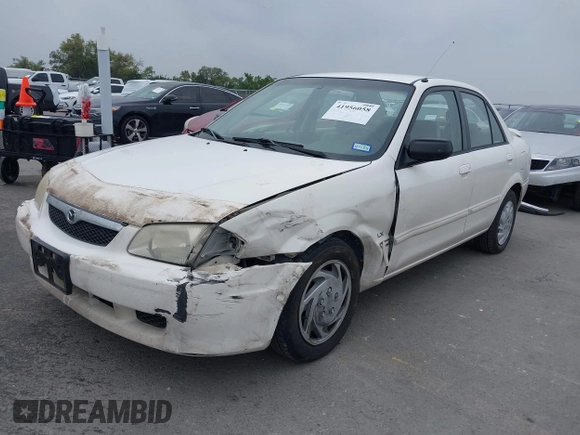 2000 Mazda Protege DX with VIN JM1BJ2220Y0273953, listed as a IAAI auction lot 41956058 with 158,837 mi miles and . Bid and sale history available at DreamBid. Image 18.