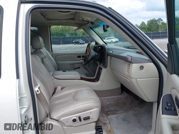 2005 Cadillac Escalade z VIN 1GYEK63N55R123817, wystawiony jako IAAI lot #42263549 z przebiegiem 297 279 mil mil oraz . Historia ofert i sprzedaży dostępna na DreamBid. Obrazek 5.