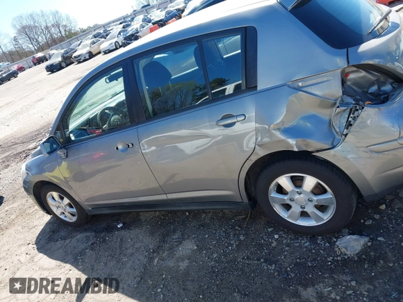 2012 Nissan Versa S with VIN 3N1BC1CP0CK206613, listed as a IAAI auction lot 41836647 with 180,698 mi miles. Bid and sale history available at carsss.com. Image 14.