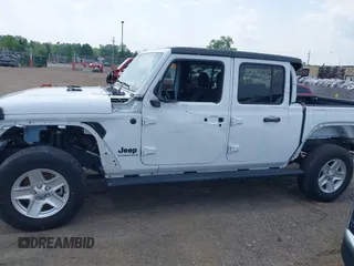 2023 Jeep Gladiator Sport S with VIN 1C6HJTAG3PL532694, listed as a IAAI auction lot 42446863 with 40,525 mi miles and . Bid and sale history available at DreamBid. Image 14.