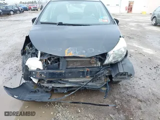2012 Toyota Yaris L with VIN JTDKTUD30CD539341, listed as a IAAI auction lot 41981342 with 210,253 mi miles. Bid and sale history available at carsss.com. Image 6.