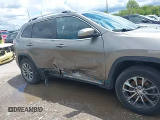 2020 Jeep Cherokee Latitude Plus with VIN 1C4PJMLB1LD569548, listed as a IAAI auction lot 42330117 with 37,897 mi miles and . Bid and sale history available at DreamBid. Image 6.