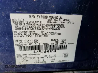 2015 Ford Taurus Limited with VIN 1FAHP2J85FG133521, listed as a Copart auction lot 57411685 with 140,535 mi miles and Salvage title. Bid and sale history available at DreamBid. Image 13.