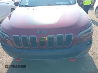 2019 Jeep Cherokee Trailhawk with VIN 1C4PJMBX5KD421043, listed as a IAAI auction lot 42570336 with 114,463 mi miles and . Bid and sale history available at DreamBid. Image 6.