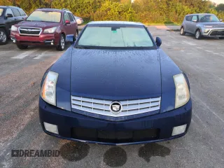 2004 Cadillac XLR z VIN 1G6YV34A945601993, wystawiony jako Copart lot #75136134 z przebiegiem Nie podano mil oraz Nie do naprawy. Historia ofert i sprzedaży dostępna na DreamBid. Obrazek 5.