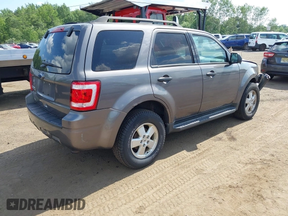 2012 Ford Escape XLT with VIN 1FMCU9D75CKC22907, listed as a IAAI auction lot 42571195 with 198,537 mi miles and . Bid and sale history available at DreamBid. Image 4.