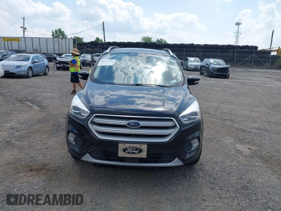 2018 Ford Escape Titanium z VIN 1FMCU9J9XJUB66275, wystawiony jako IAAI lot #42757952 z przebiegiem 97 629 mil mil oraz . Historia ofert i sprzedaży dostępna na DreamBid. Obrazek 12.