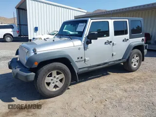2008 Jeep Wrangler Unlimited X with VIN 1J4GA39168L592999, listed as a IAAI auction lot 42699909 with 158,128 mi miles and . Bid and sale history available at DreamBid. Image 17.