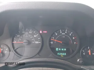 2007 Jeep Wrangler Unlimited X with VIN 1J4GA39127L231378, listed as a IAAI auction lot 42252475 with 152,568 mi miles and . Bid and sale history available at DreamBid. Image 7.
