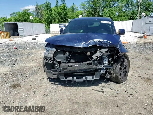 2018 Dodge Durango SXT with VIN 1C4RDJAG4JC161335, listed as a Copart auction lot 57243095 with 74,690 mi miles and Salvage title. Bid and sale history available at DreamBid. Image 14.