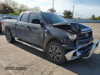 2010 Toyota Tundra 4WD Truck with VIN 5TFUW5F17AX139175, listed as a Copart auction lot 54322715 with 206,526 mi miles and Salvage Title. Bid and sale history available at carsss.com. Image 4.